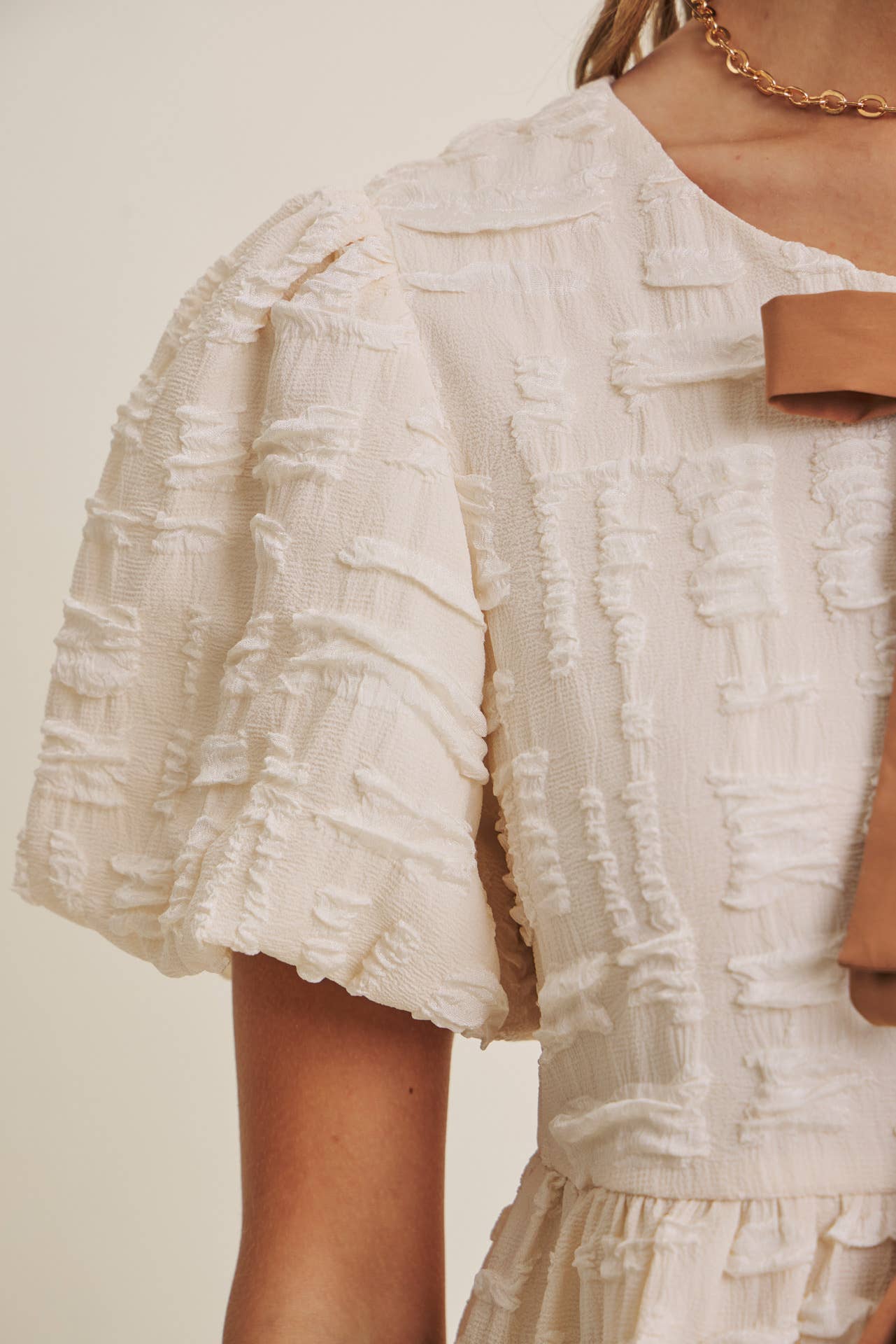 Textured Bow Babydoll blouse